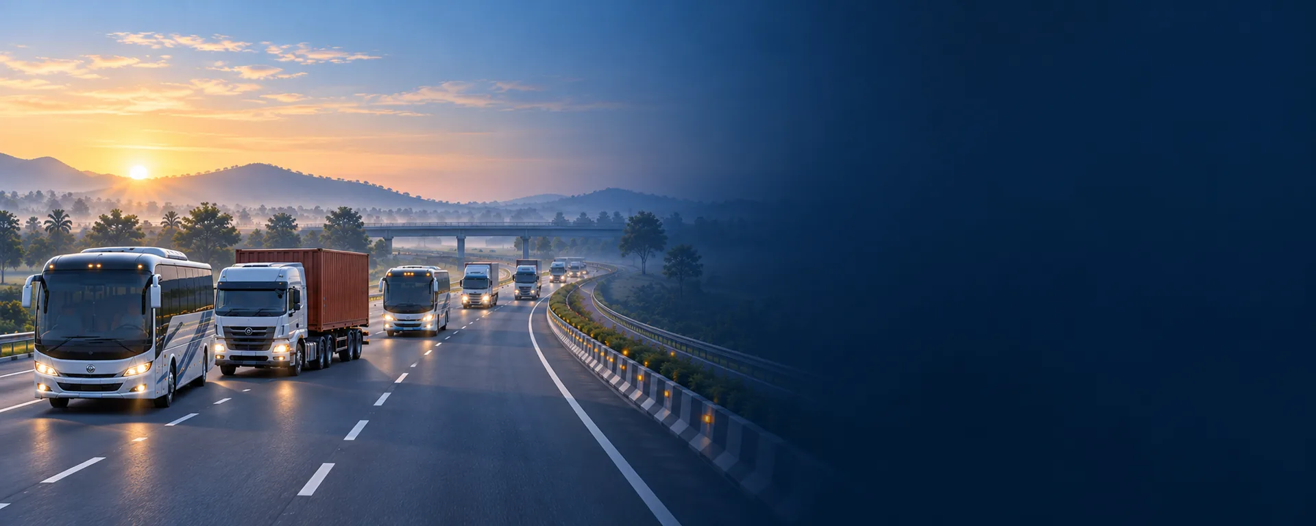 Buses and trucks travelling a national highway at sunrise